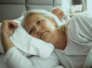 Elderly woman having trouble sleeping